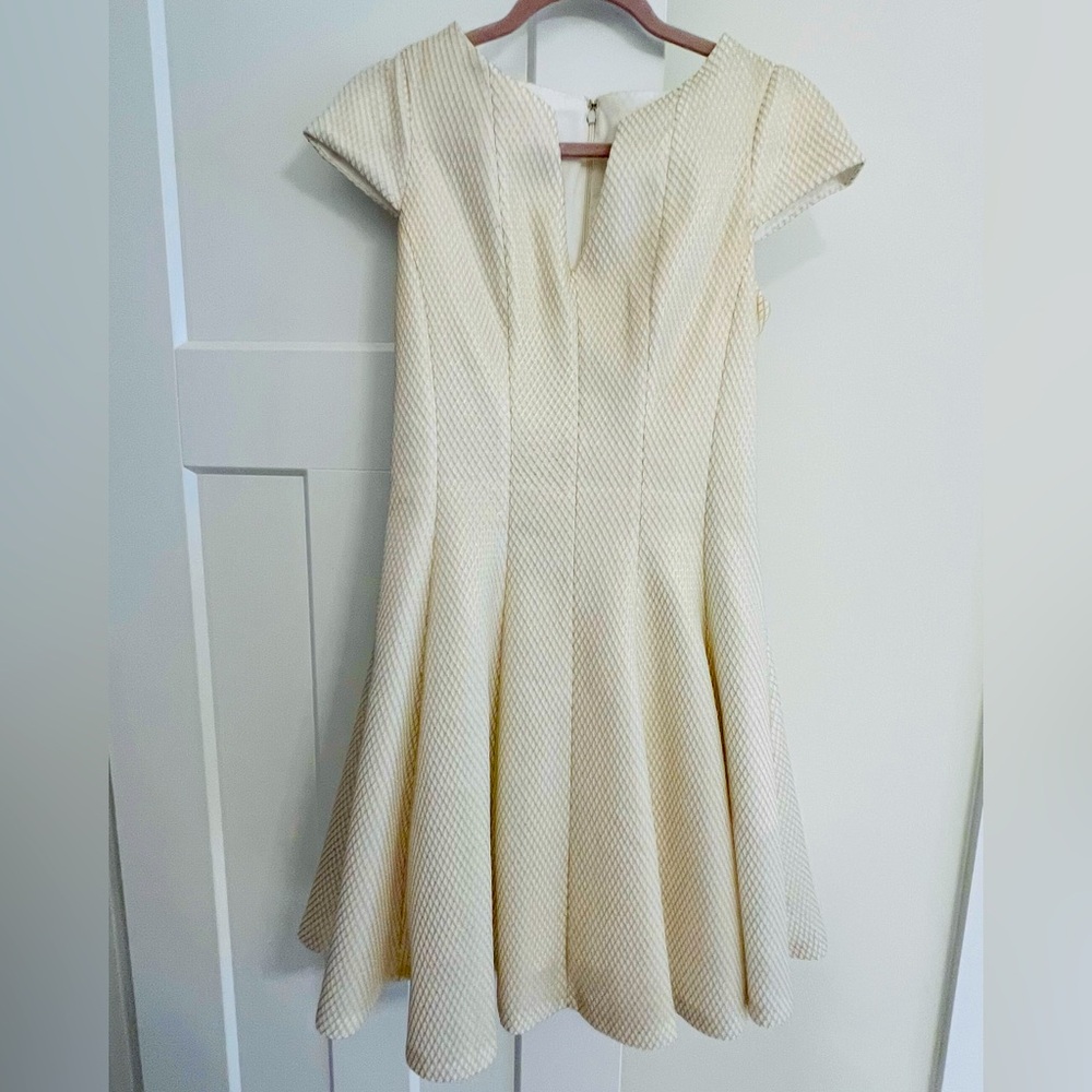 Beautiful Julia Jordan white with gold diamond sewn detail dress with pockets.